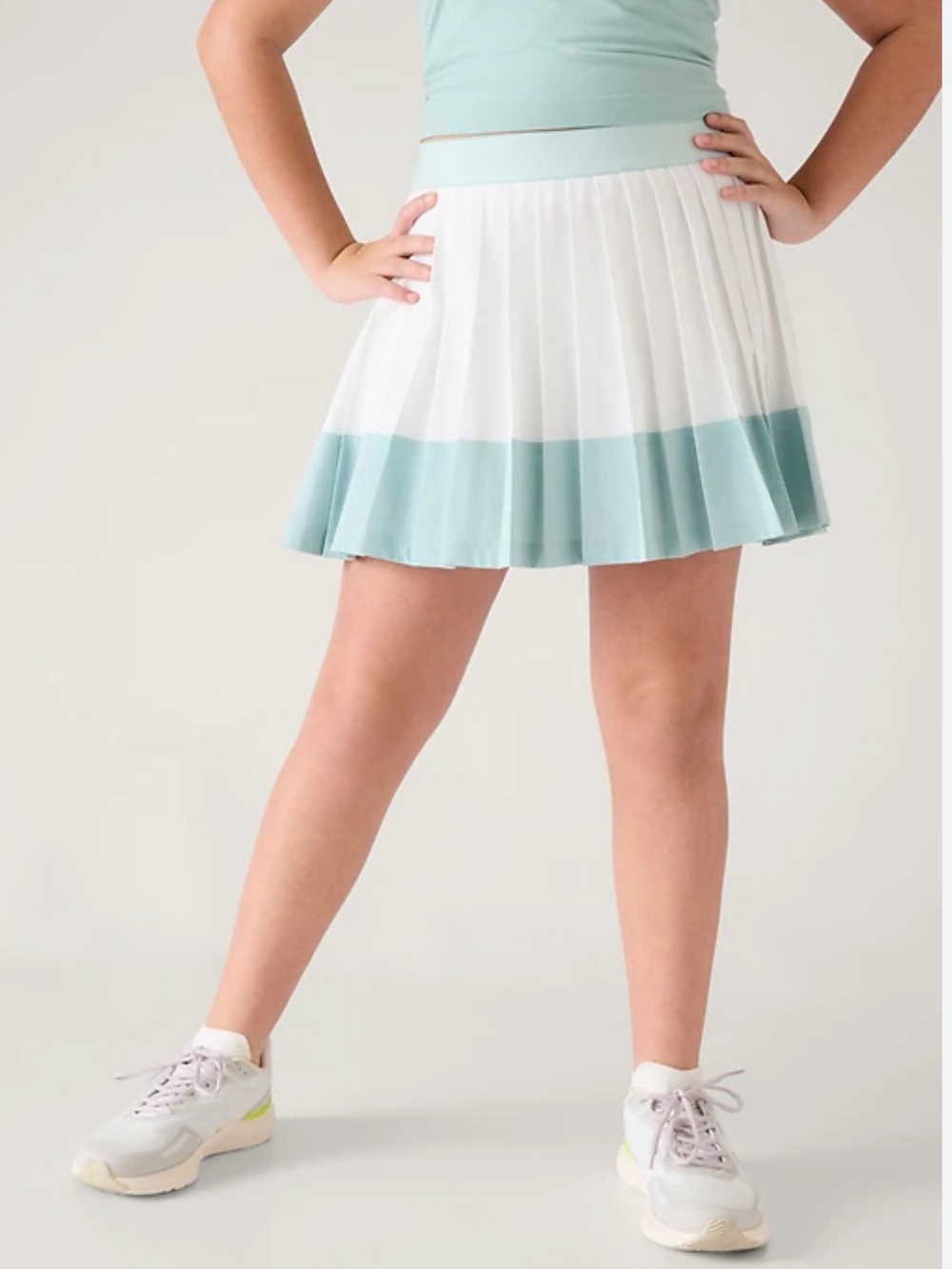 Athleta Girl Pleat White Skort with Light Teal Hem